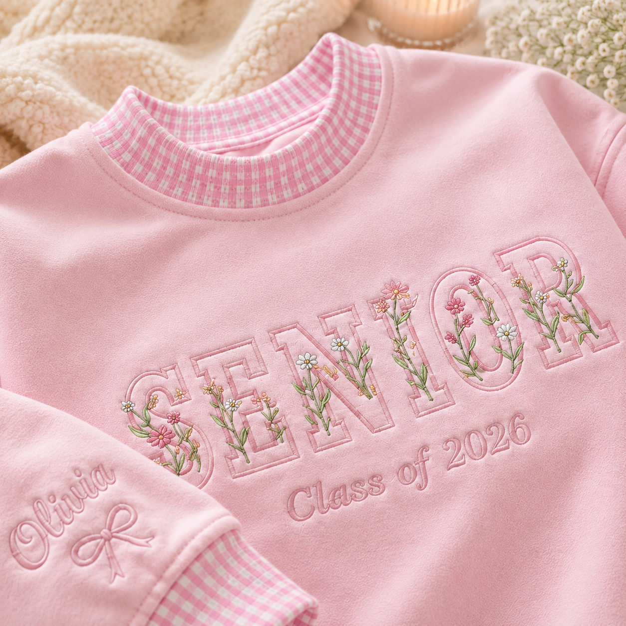 Close up of embroidered SENIOR Class of 2026 floral sweatshirt design