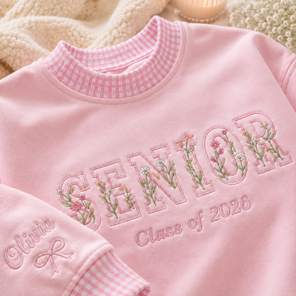 Close up of embroidered SENIOR Class of 2026 floral sweatshirt design