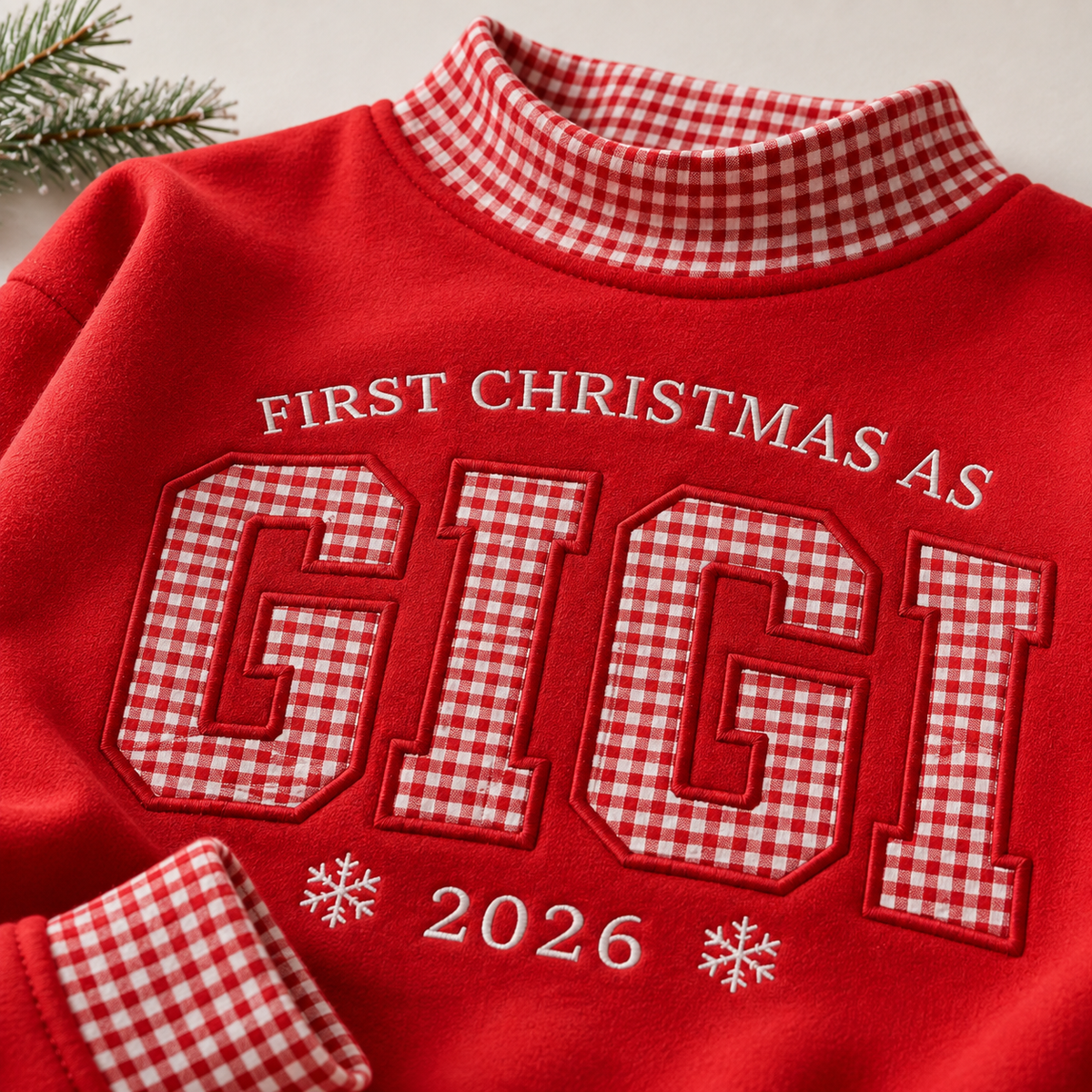 Close-up of red Gigi Christmas sweatshirt